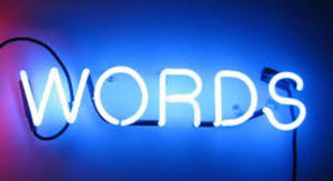 words in neon sign